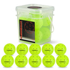 10 green outdoor Cannonballz balls arrayed beneath their clear plastic 10-pack container on a white background.