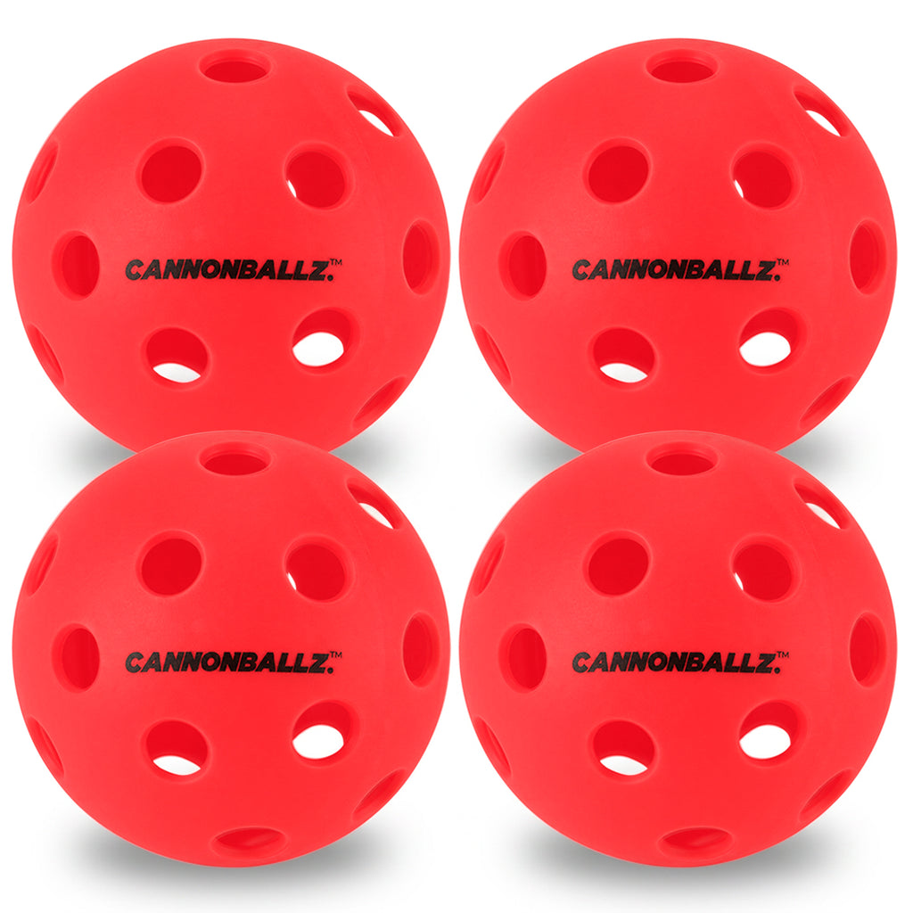 Four bright red Cannonballz  indoor pickleball balls on a white background