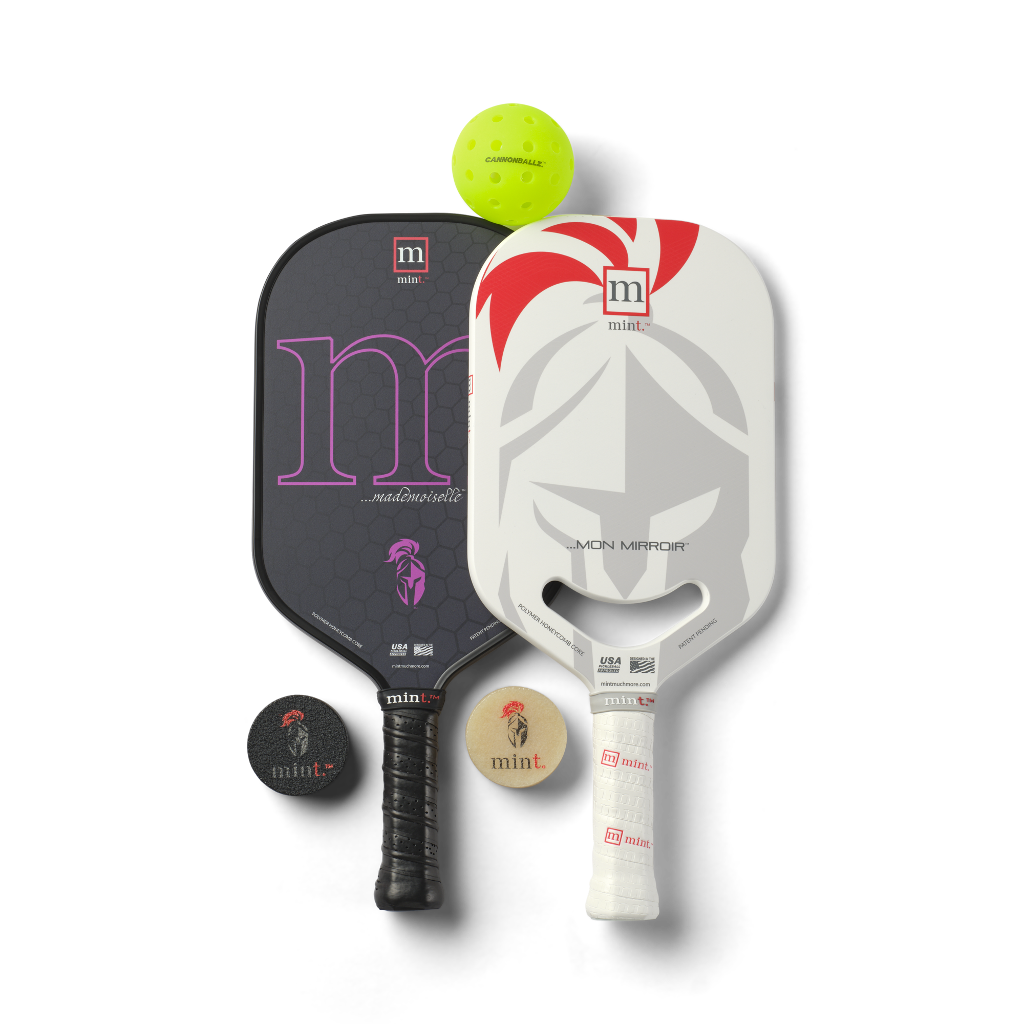 Two pickleball paddles with a ball and two paddle erasers on a white background