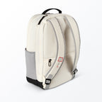 A white Mint Pro Spartan Paddle Backpack with red and gray accents.