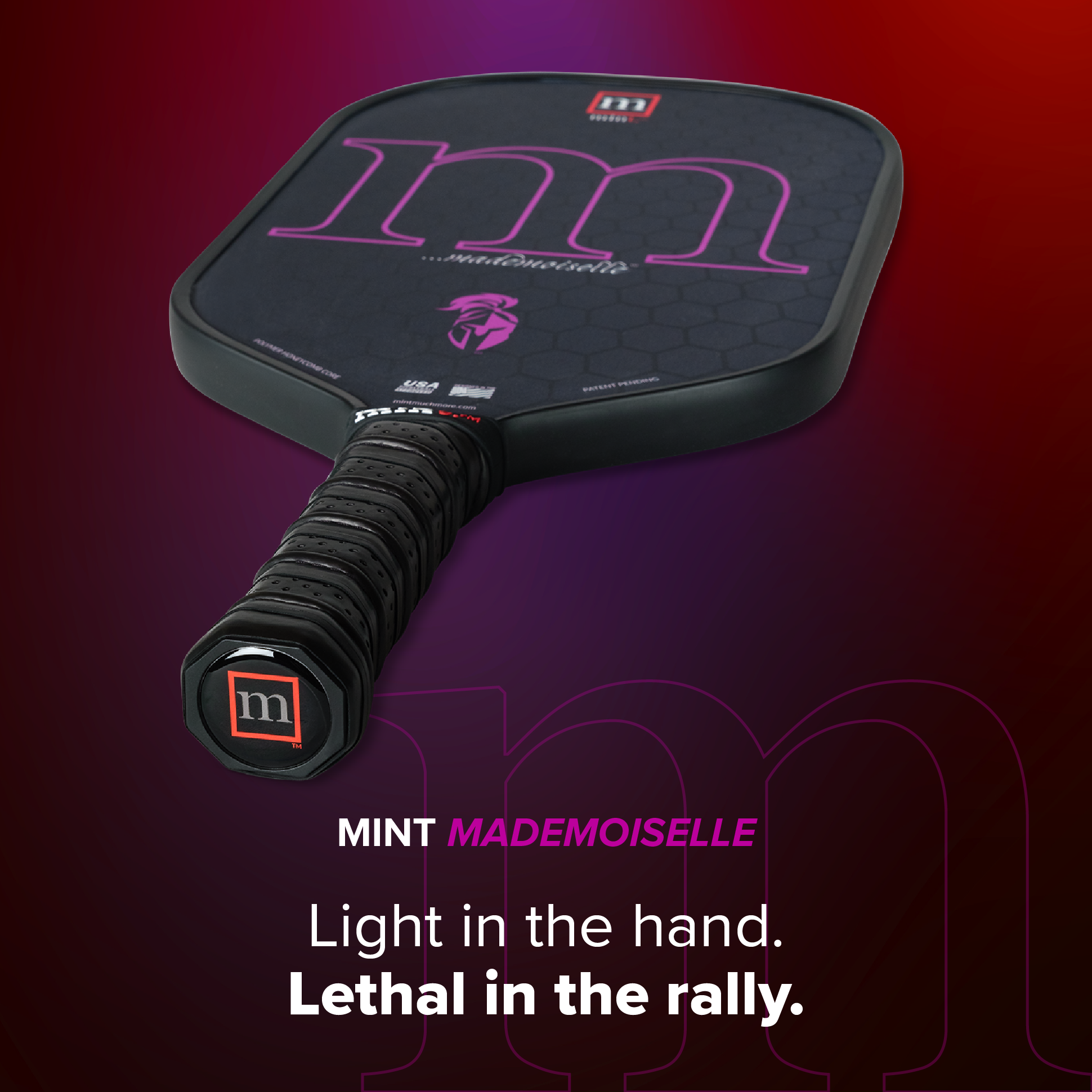 Pickleball paddle with 'm' branding on a purple background