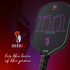 Pickleball paddle with 'mint' branding on a dark background