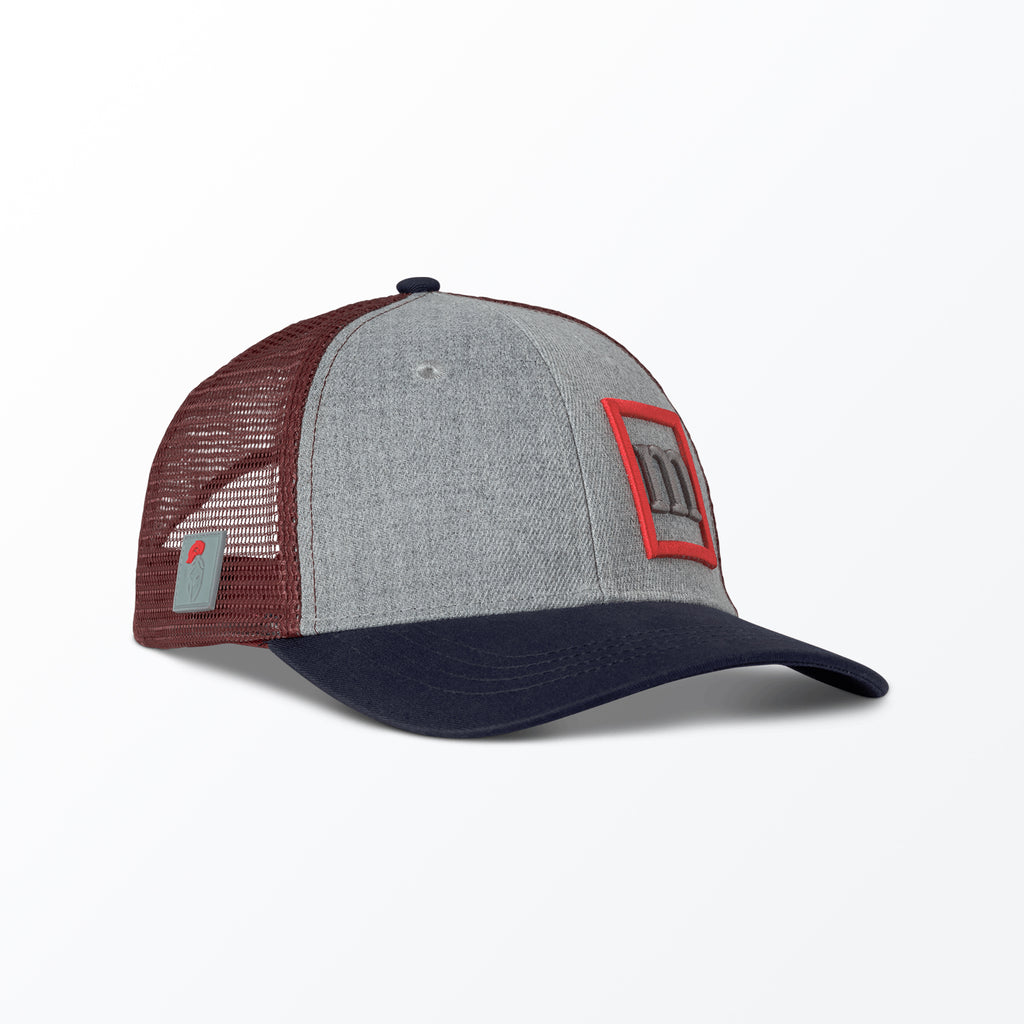 A gray and burgundy trucker hat with a mesh back and a 3D embroidered logo on the front.