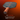 Pickleball paddle with orange handle and gray surface on a red background, featuring the brand 'Mint Mon Marteau'.