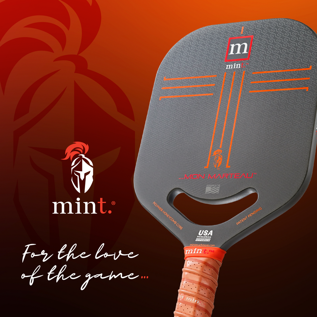 Pickleball paddle with 'mint.' branding on a dark background
