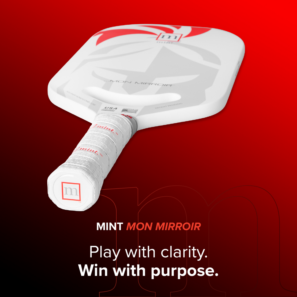 White paddle with red accents on a red background, featuring the brand 'Mint Mon Mirror'.