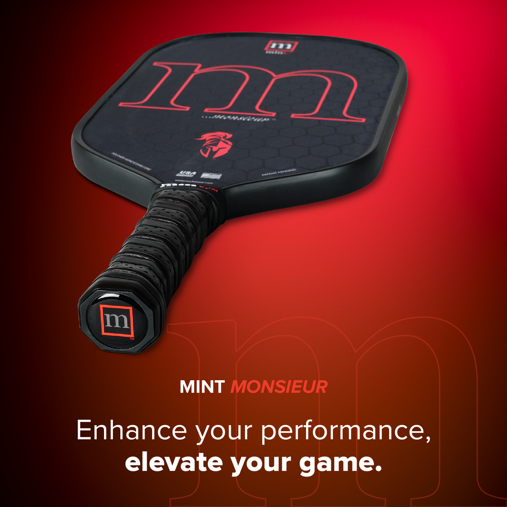 Pickleball paddle with 'm' logo on a red background