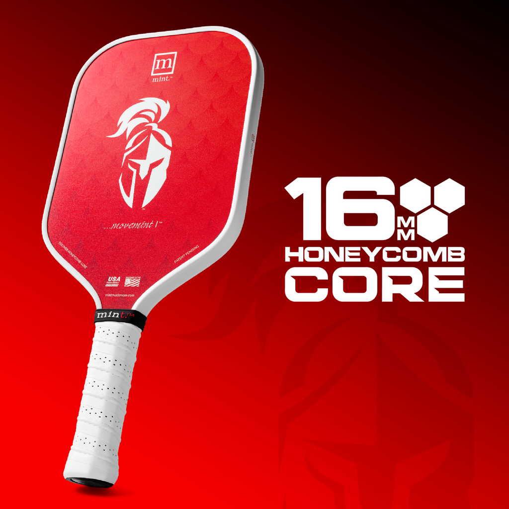 Red pickleball paddle with white handle on a red background, featuring '16 MM Honeycomb Core' text.