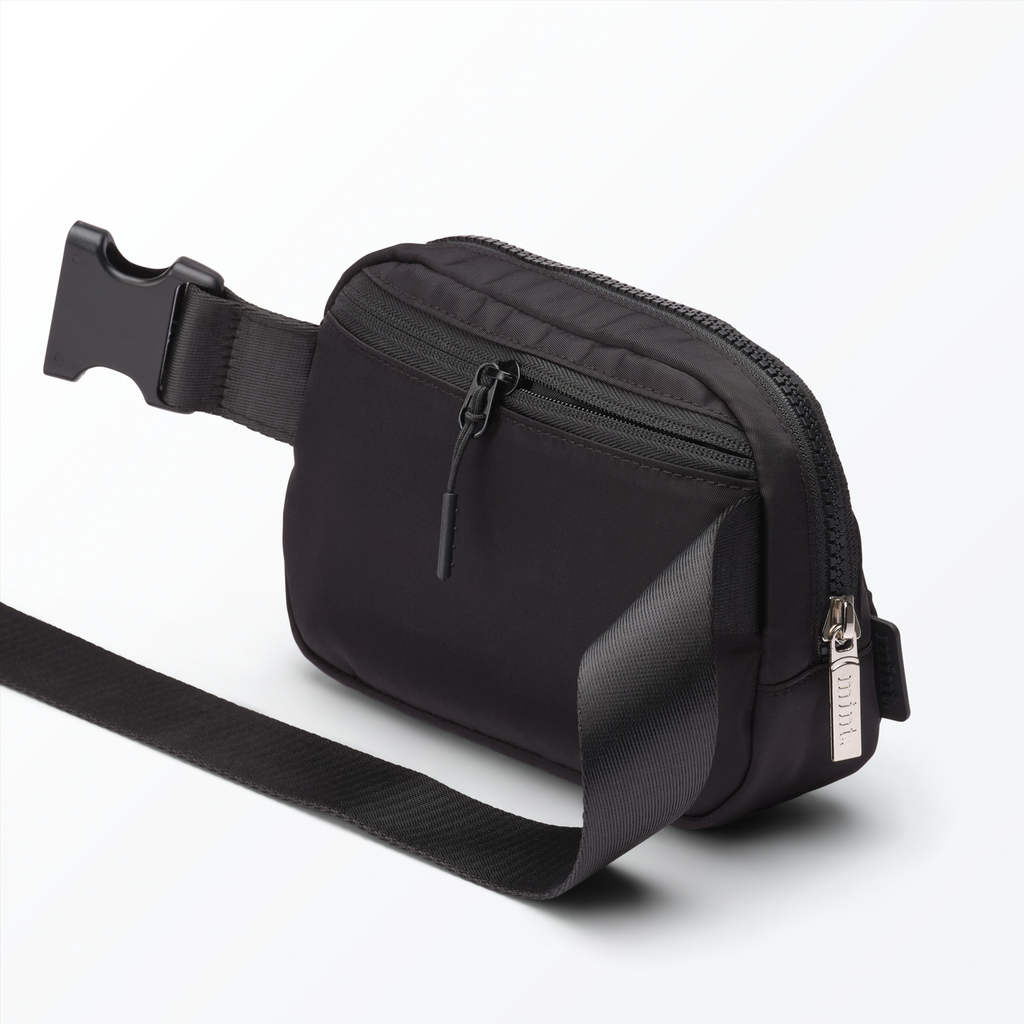 Studio image of a black Mint belt bag on a white background