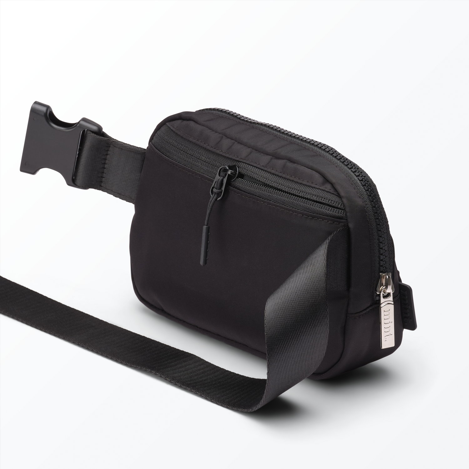 Studio image of a black Mint belt bag on a white background