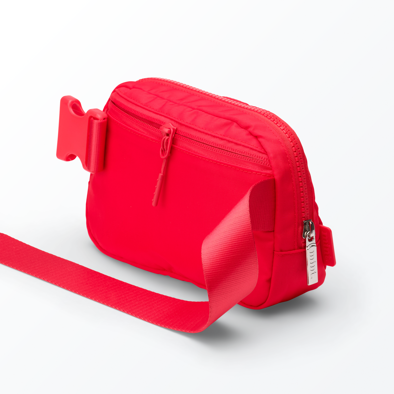 Studio image of a cream-colored Mint belt bag on a white background