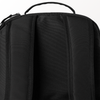 Close-up of a black backpack with a handle on a white background