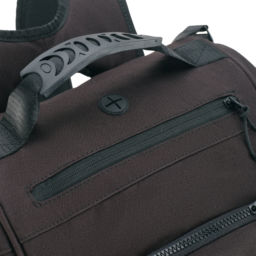 Unleash Tournament Bag in Black, top handle and zip pocket with earphone port