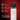 White insulated water bottle with black lid on a red background, featuring Mint brand.