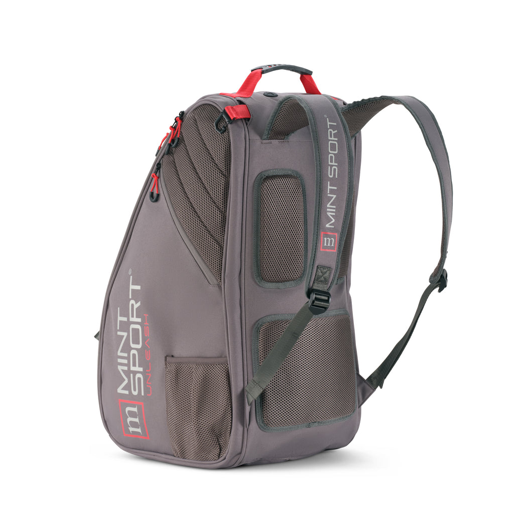 Unleash Tournament Bag in Gray, three-quarter back view with padded shoulder straps