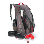Unleash Tournament Bag in Gray, packed for pickleball with paddles, pickleballs and a water bottle