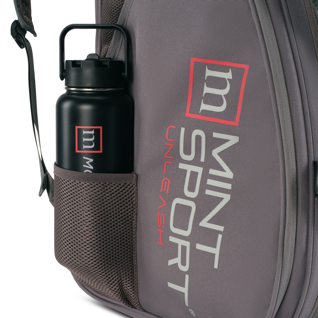 Unleash Tournament Bag in Gray, water bottle in an external bottle holder