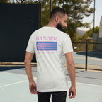 Man wearing a white t-shirt with 'Banger Rally Wrecker' design on a tennis court