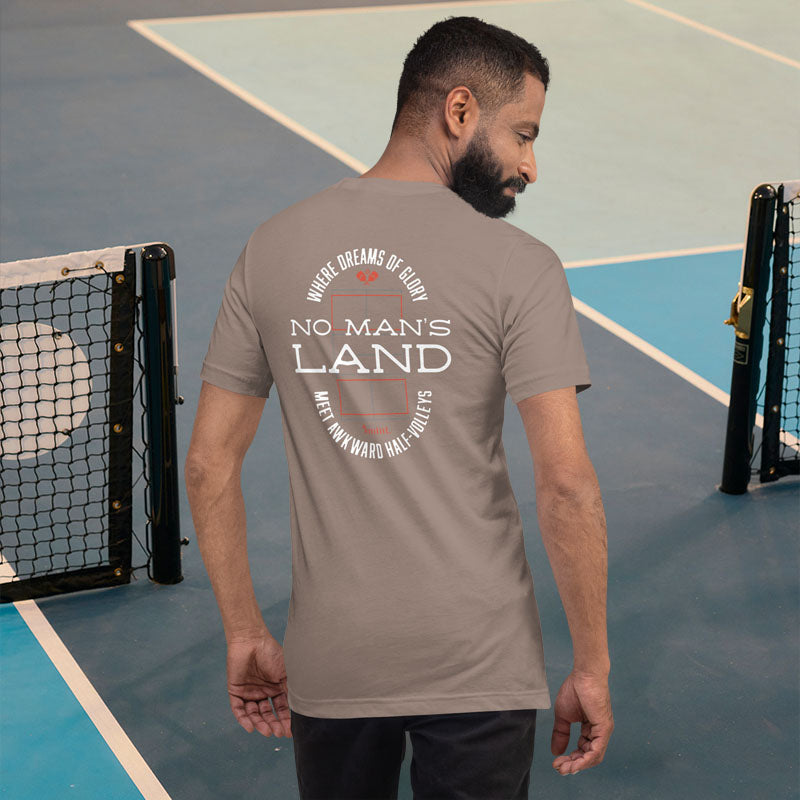 Man wearing a 'No Man's Land' t-shirt on a tennis court