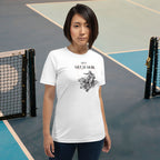 Woman wearing a white t-shirt with text and graphics on a tennis court