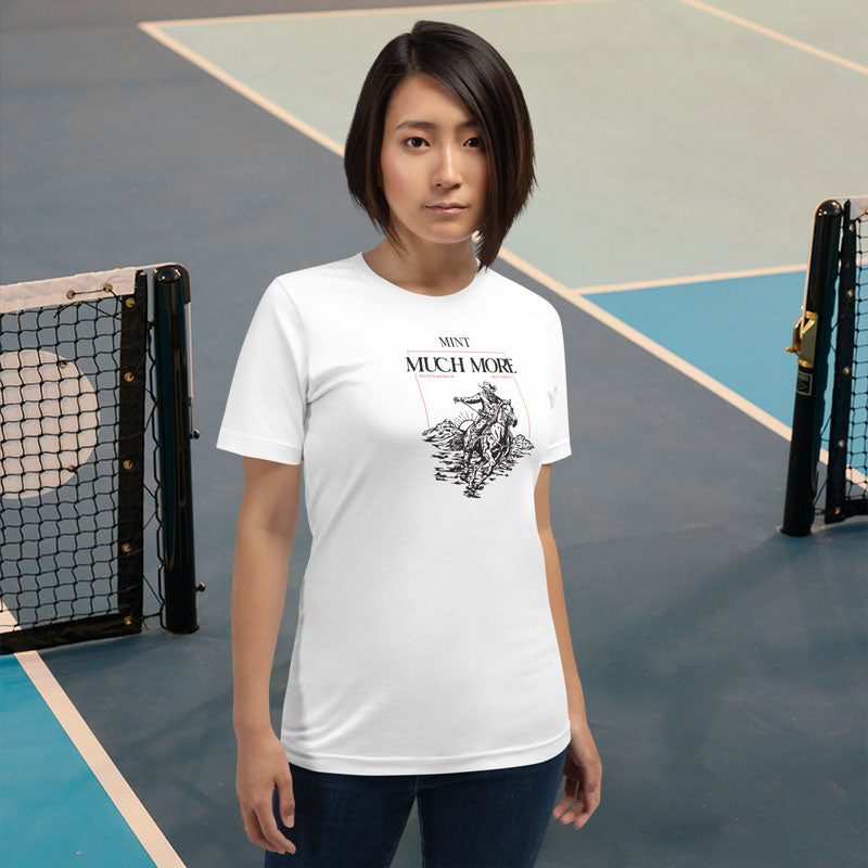 Woman wearing a white t-shirt with text and graphics on a tennis court