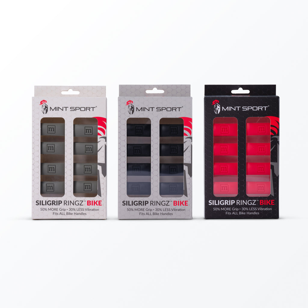 Three packages of gray, black, and red Mint Sport Siligrip Ringz Bike handlebar grips on a white background